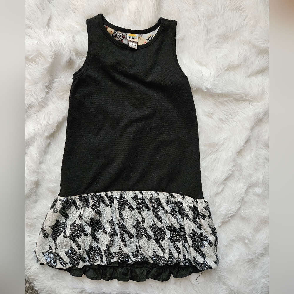 Black and White Sleeveless Dress with Houndstooth Sequin Hem